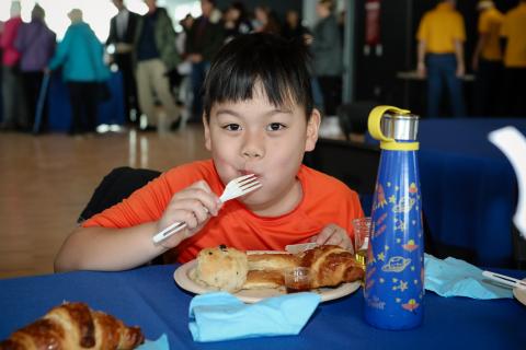 Child eating breakfast food